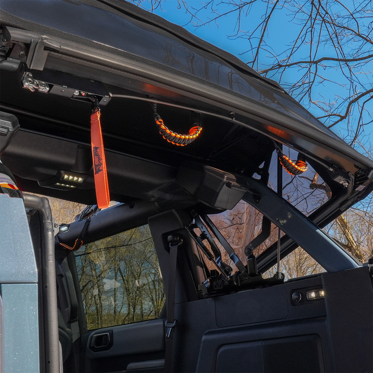 IAG Off-Road EZ-Lift® & V2 EZ-Pull Combo Kit For 2021-26 Ford Bronco 4 Door Soft Top - Installed with Optiona Orange Paracord Handles